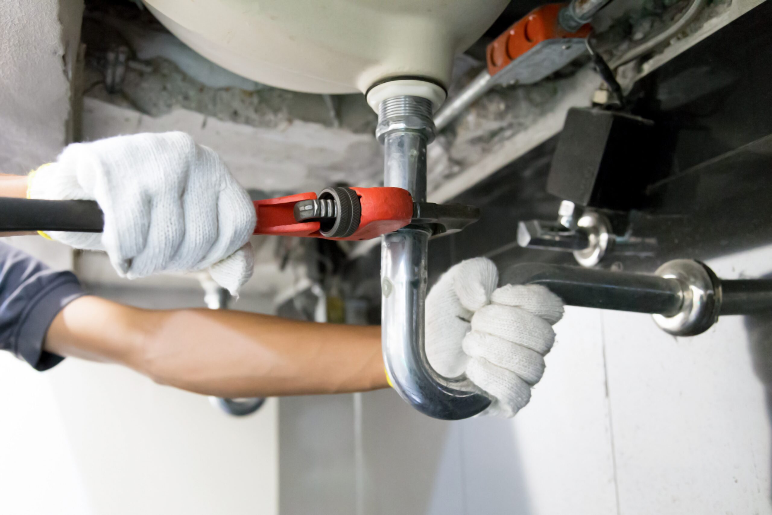 Technician,Plumber,Using,A,Wrench,To,Repair,A,Water,Pipe Technician,Plumber,Using,A,Wrench,To,Repair,A,Water,Pipe